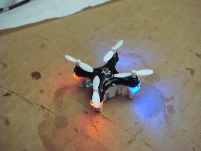 It has leds, and when battery is low the leds flash just like my Hubsan 107D