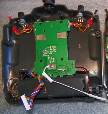 Remover the PCB green back board before removing <br />the module bay plastic pin supports.