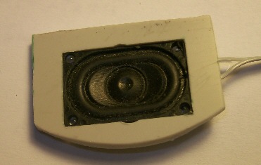 Speaker put into the frame with a tight fit
