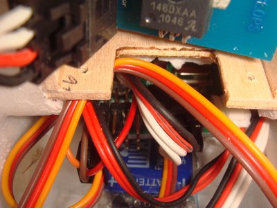 Below the current sensor cradle is the OSD board and further down is the ESC, 1cm spacing in between.