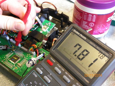 Brown Resistor next to the larger yellow Capacitor where I soldered the Red wire, is Reading: 7.81 ohm