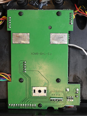 Open up your 9x radio and remove the back green PC board so that the 5 pins <br />are out of the way before removing the interfering plastic.