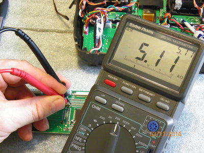 Far left 512 Resistor on my corresponding Stock 9x Fuse Brick Mainboard and it reads: 5.11 ohms. (Pic 07)