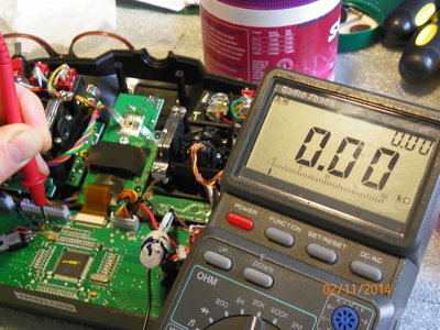 Probe to top of Brown Resistor next to 3.3V Regulator and small yellow capacitor reading. (Pic 16)