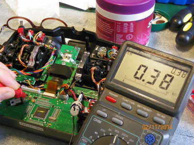 Small Brown Resistor to the Right of the 3.3V Regulator and then the Small Yellow Capacitor, has a reading of .38 ohm.